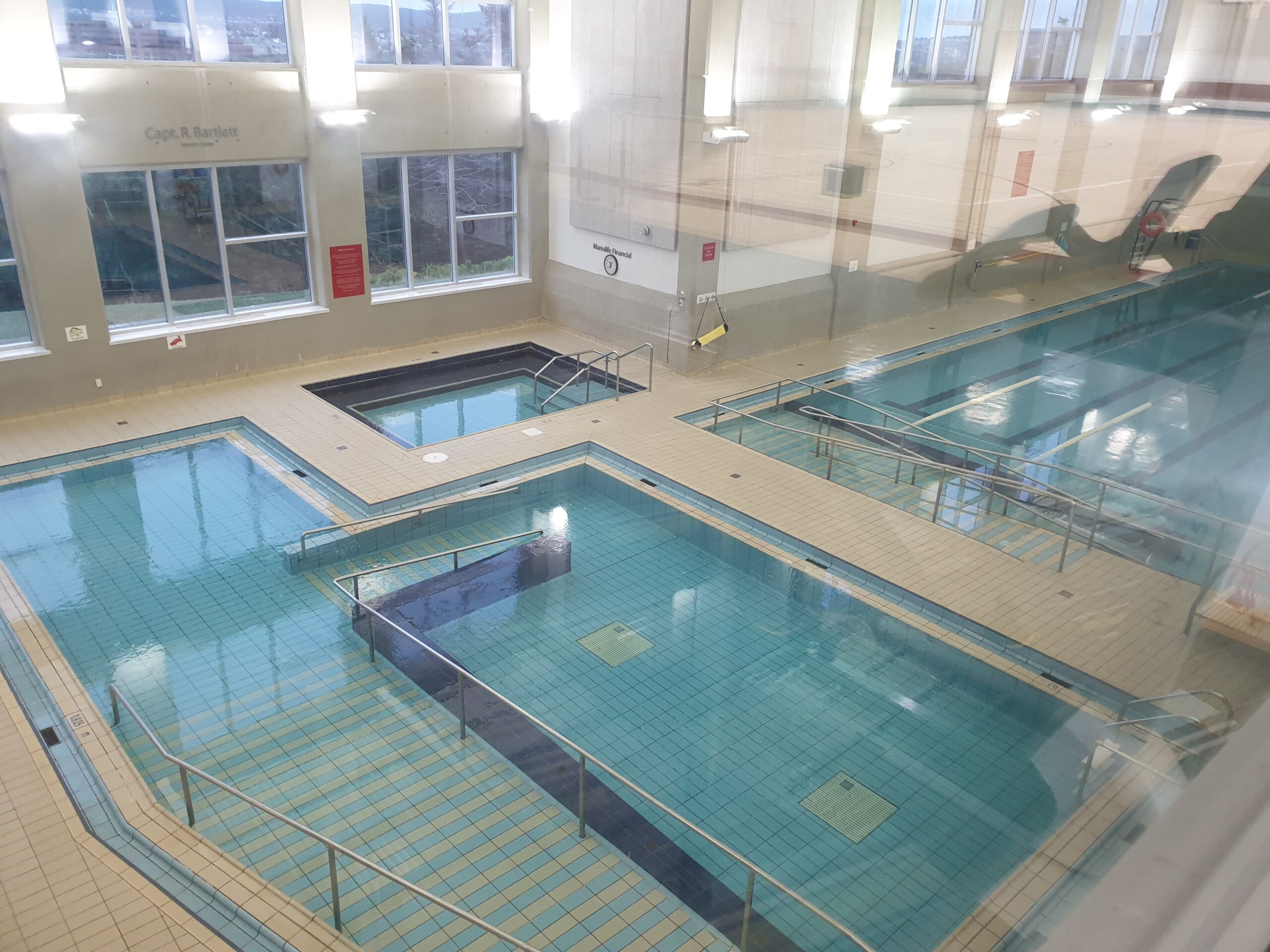 an aerial view of an indoor swimming pool