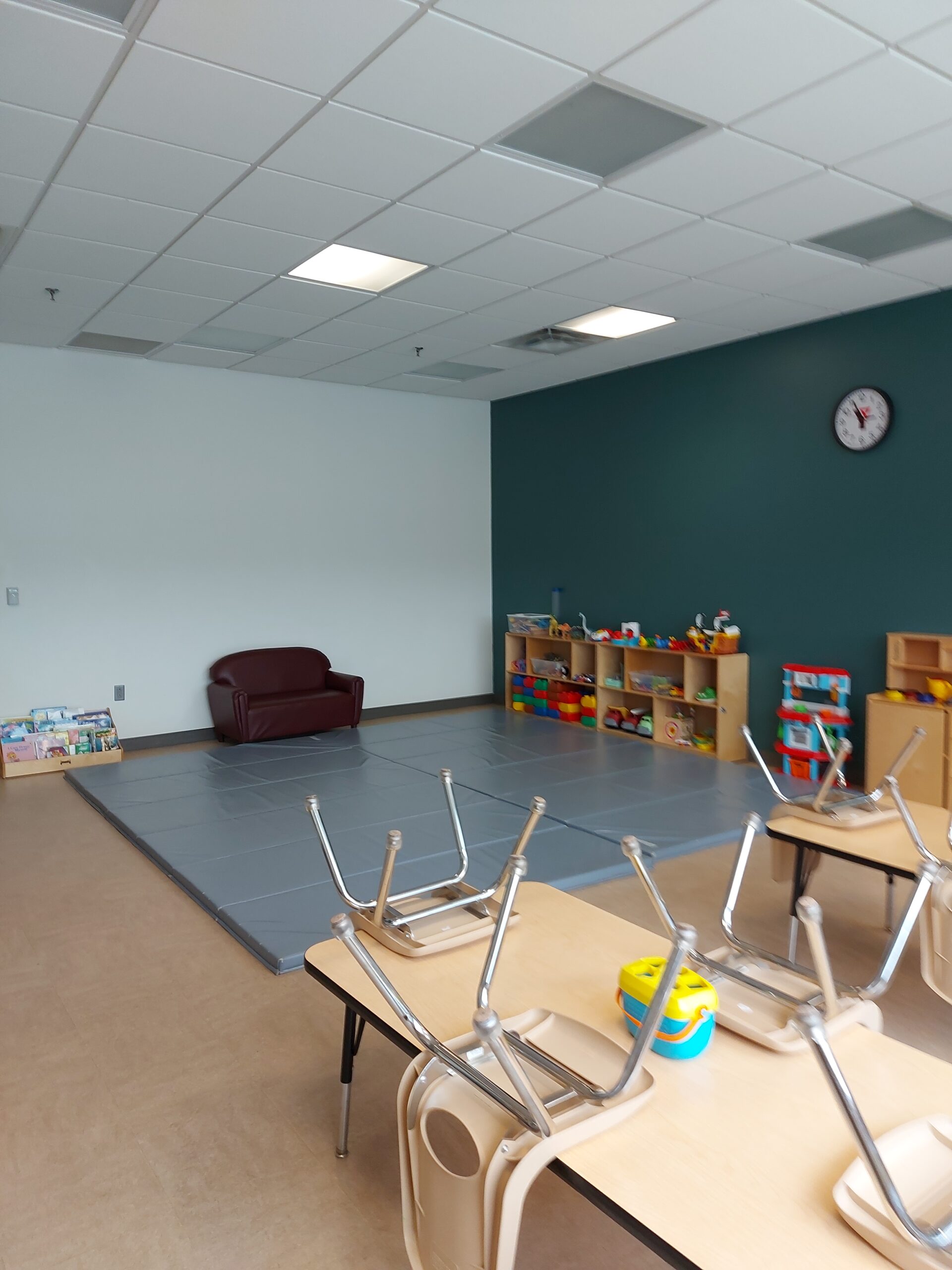 A wide angle view of a birthday party room at the YMCA