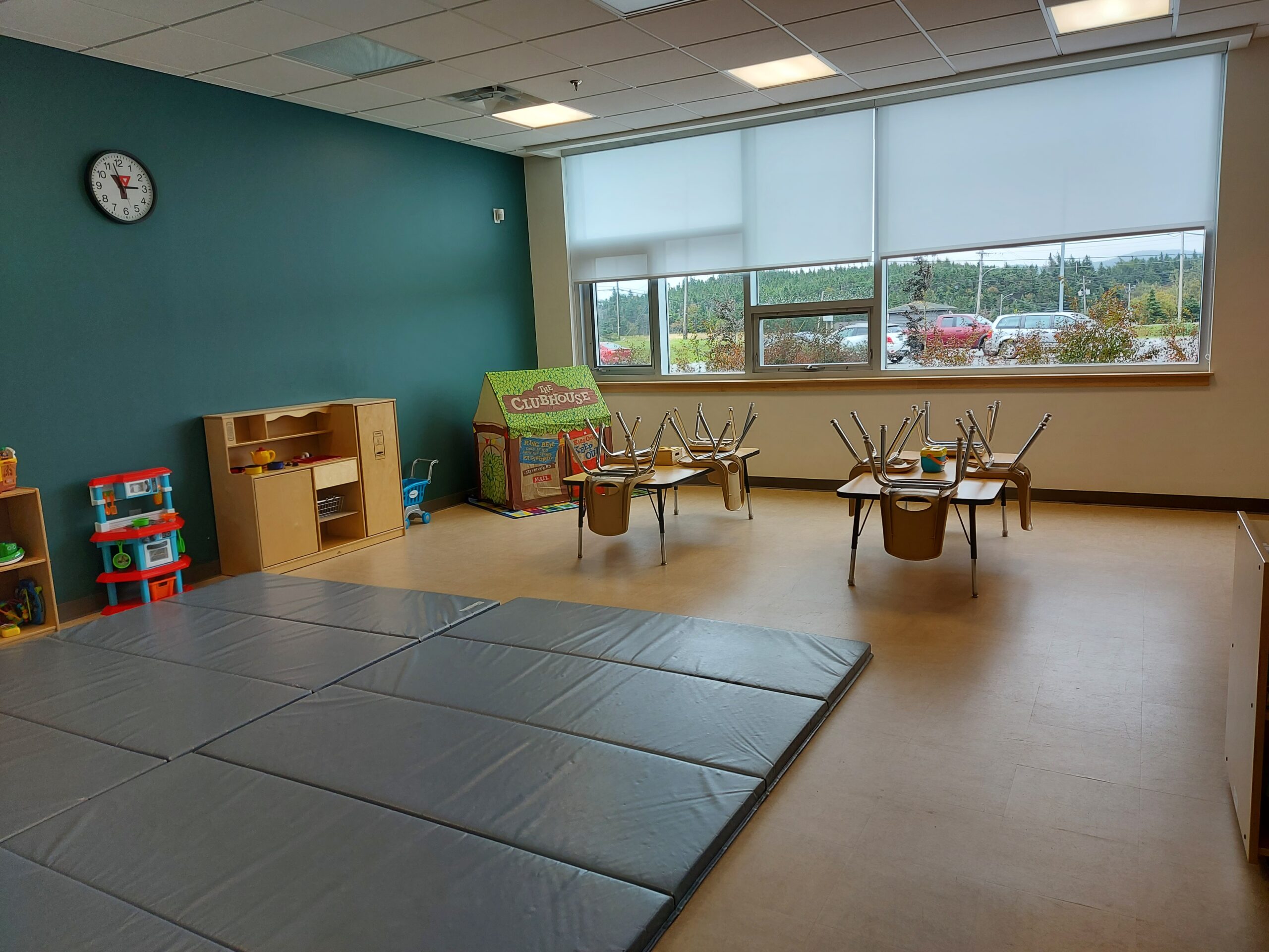 A wide angle view of a birthday party room at the YMCA